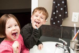 Children brushing their teeth. Dental health for children in Springfield Lorton Dental Group, VA.